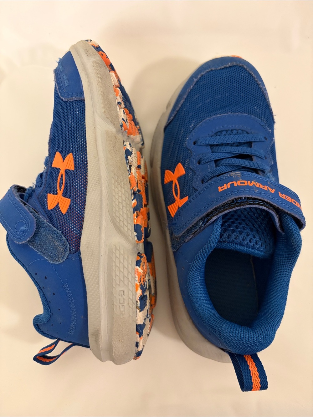 Under Armour Kids Blue Sneakers with Orange Accents